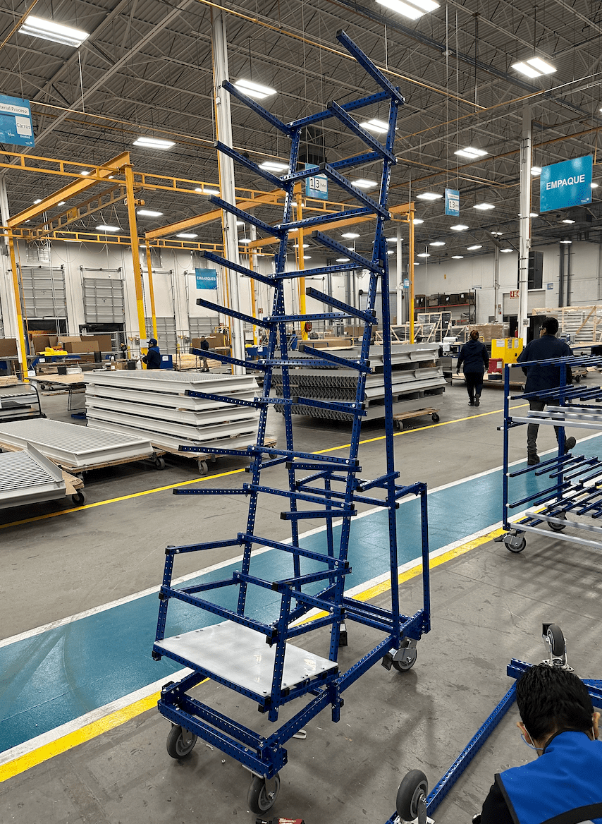 70 degree Angled cart made of blue steel tubes by Johnson Controls Team during Kaizen Event at Juarez, MX Facility 