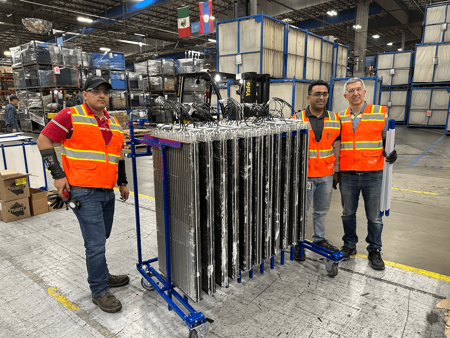 Johnson Controls Wichita, Kansas cart designed to hold parts that do not touch. Using steel tubes and casters. 