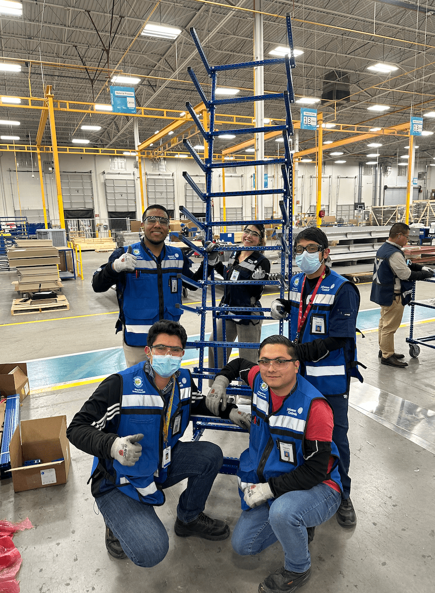 70 degree Angled cart made of blue steel tubes by Johnson Controls Team during Kaizen Event at Juarez, MX Facility 